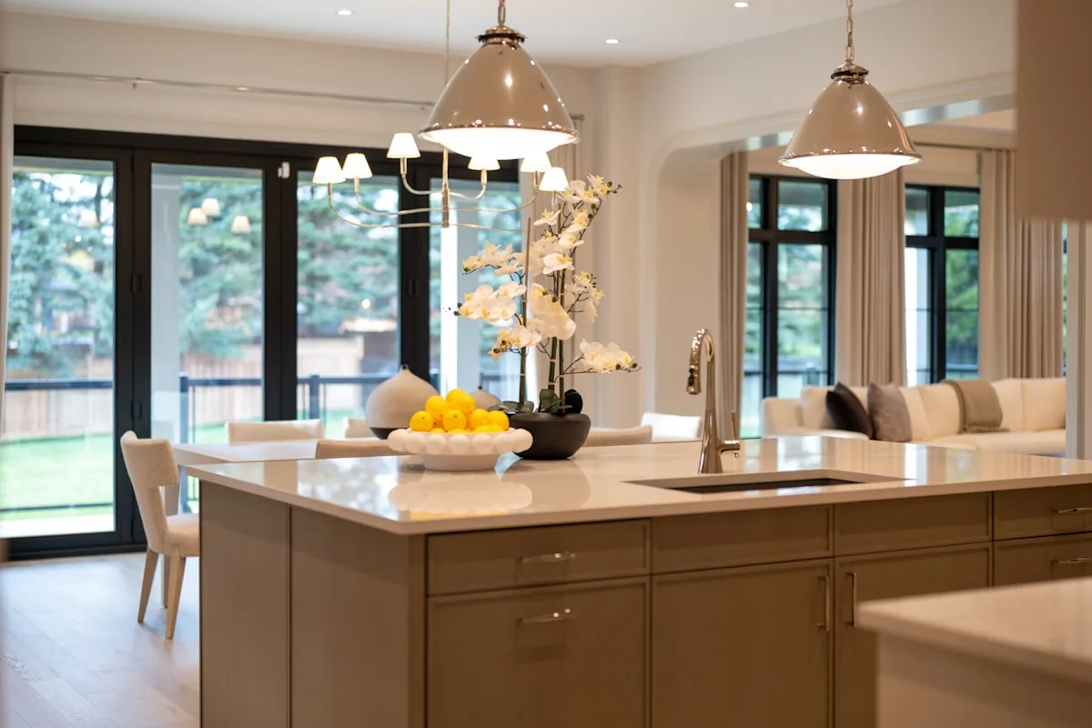 Luxury kitchen with black-framed folding glass doors opening to the backyard, Palo Alto